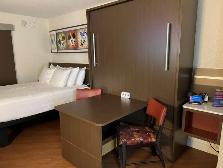 room with table bed up at all star resort