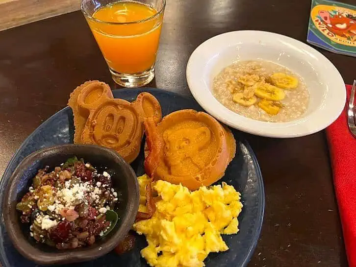 plate of food at boma breakfast buffet mickey waffles simba waffles