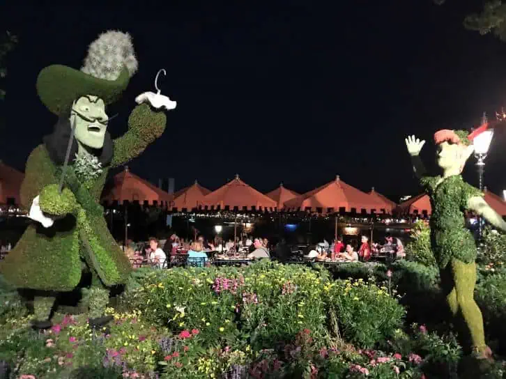 epcot vs magic kingdom atmosphere topiary