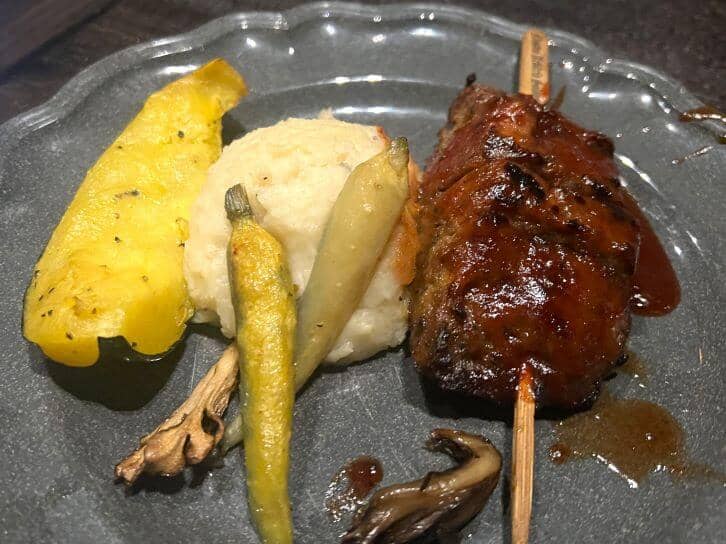 meat on a stick at das stakehaus